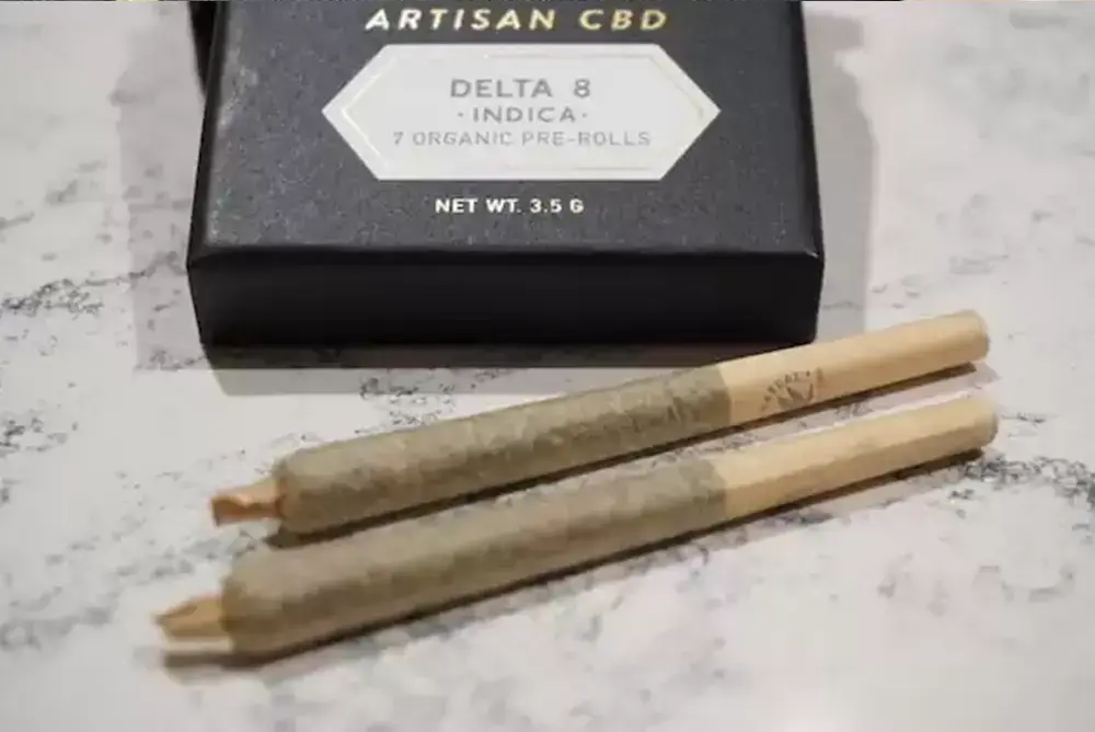 Pre-rolled CBD against a marble background