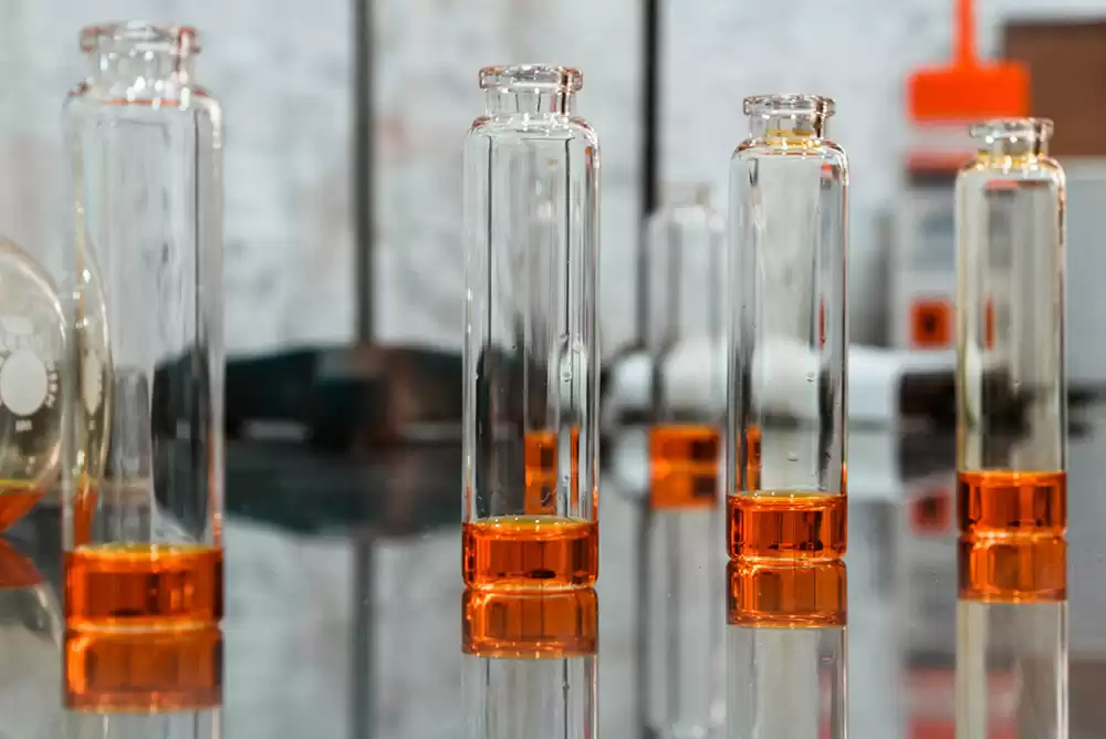 small glass vials in a scientific lab