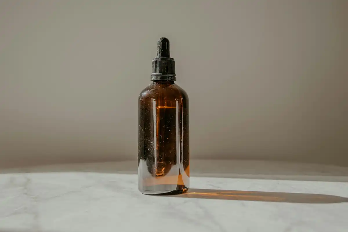 An amber dropper bottle.